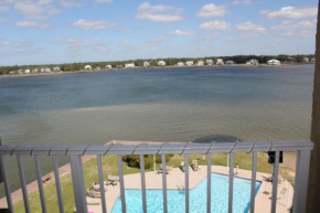 Compass Point 506 by ALBVR - Beautiful Lagoon-Front condo with great views, fishing pier, outdoor pool, indoor pool, and fitness room